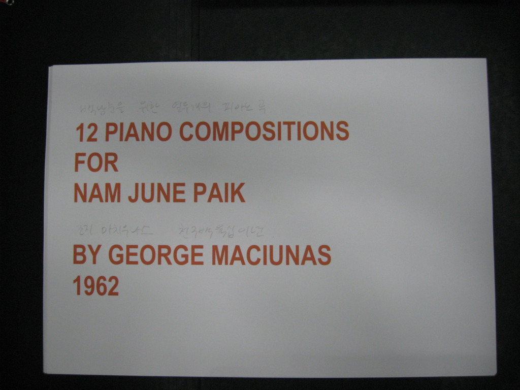 Ben Patterson, 12 Piano Compositions for Nam June Paik by George Maciunas performer’s copy of score with annotations and instructions for performance at Nam June Paik Art Center in 2010 prepared and performed by Ben Patterson, 2010, score, objects, video